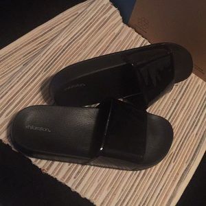 Brand new black slides